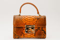 The Queen Orange Pythn Leather Handbag