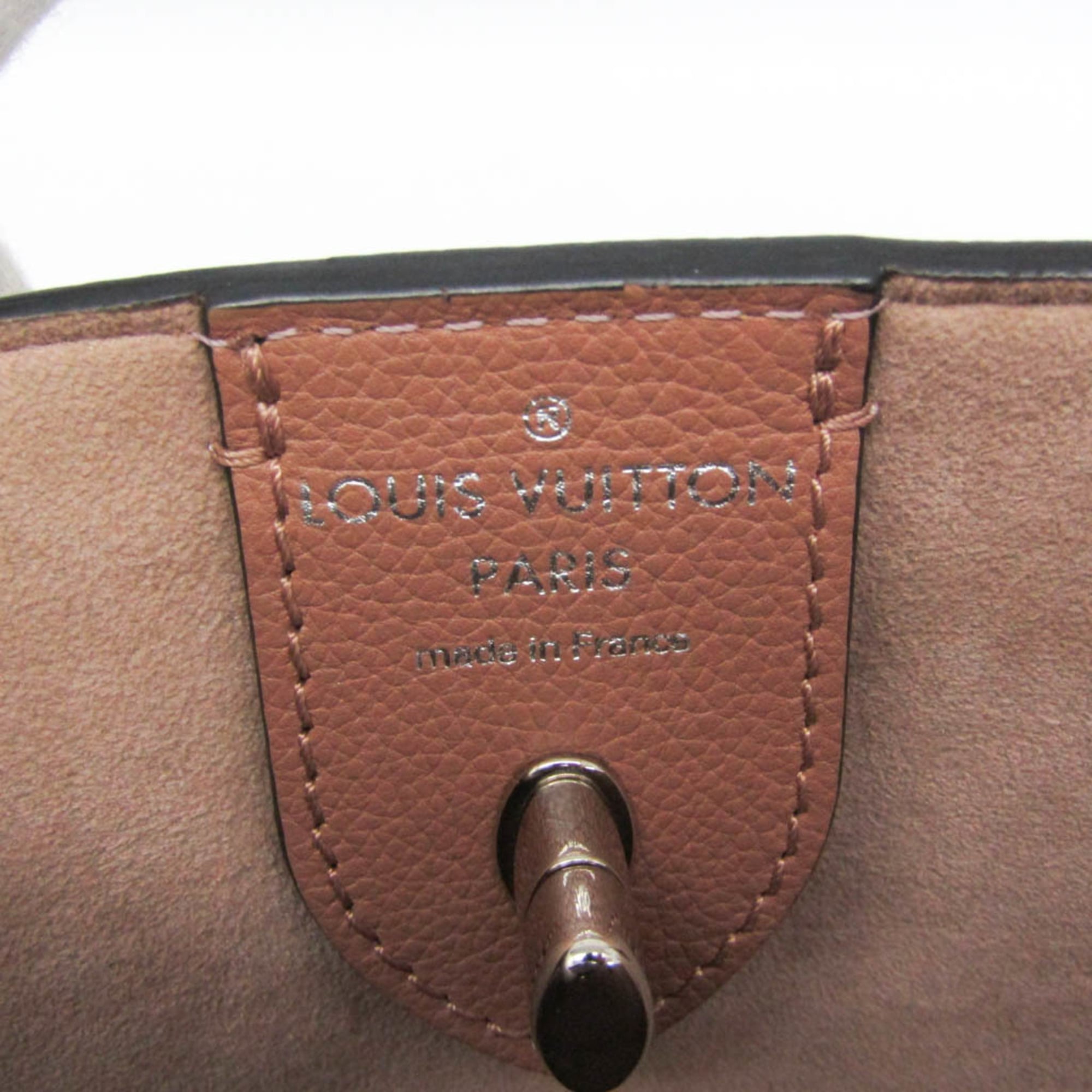 Louis Vuitton Lock Me Cabas · Calfskin Tote
