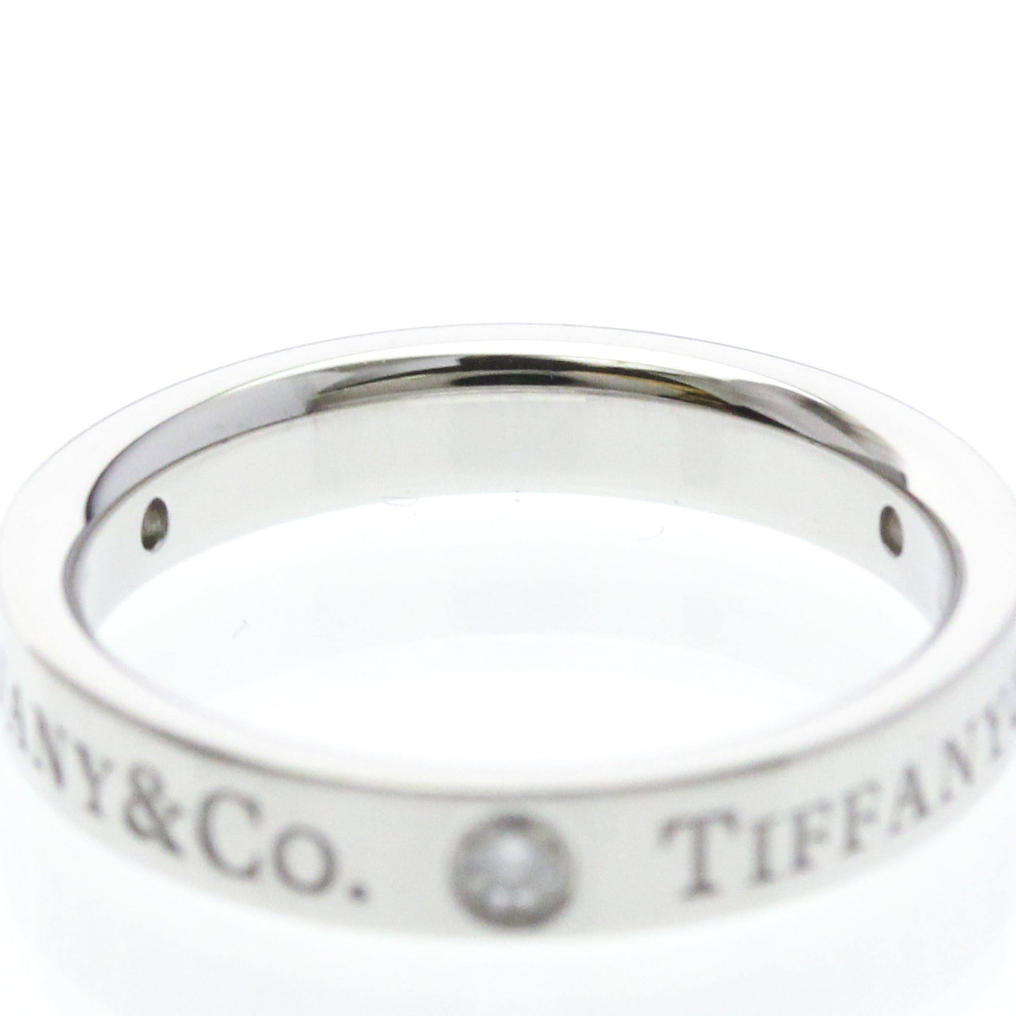 Tiffany Three Diamond · Platinum