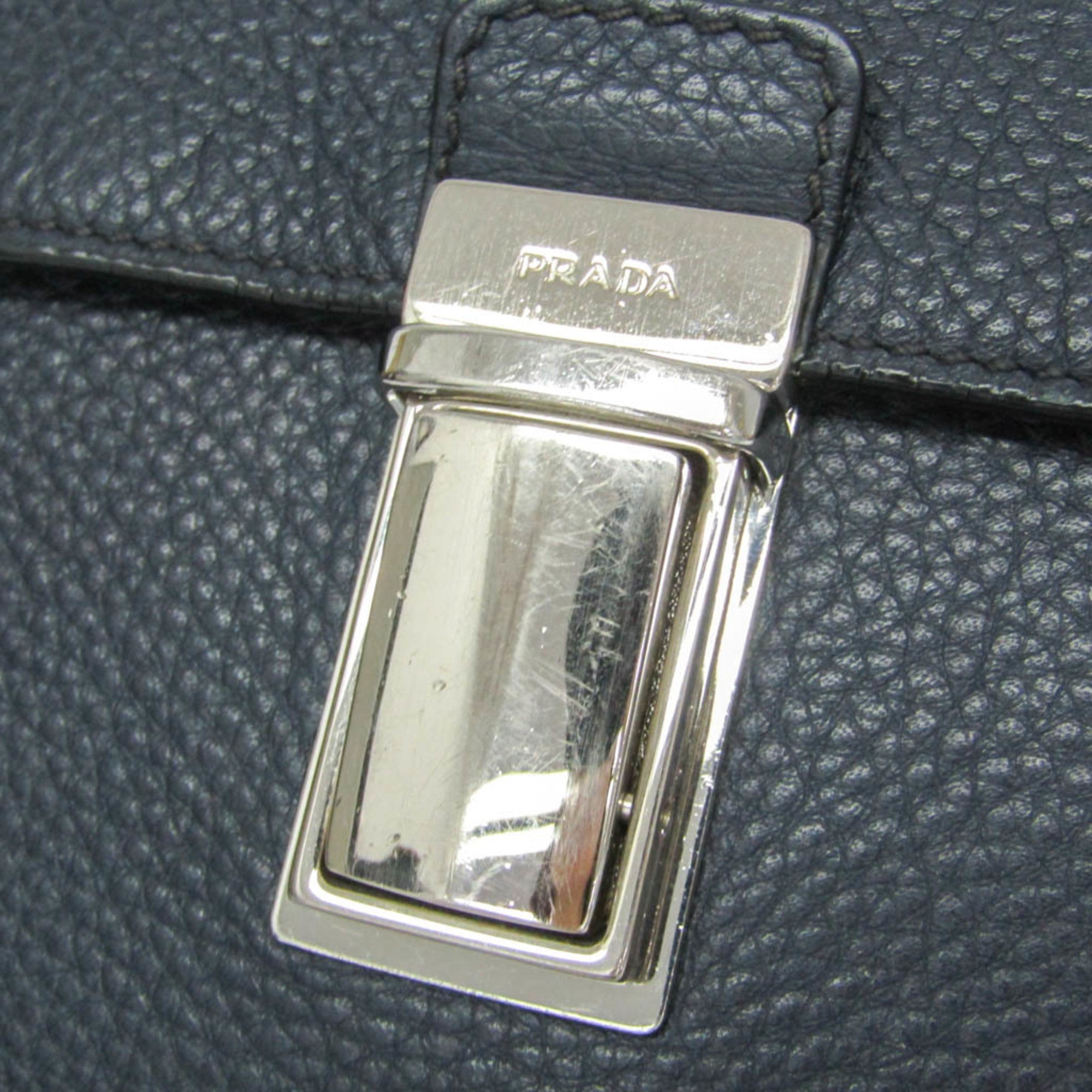 Prada Leather Messenger · Push Lock