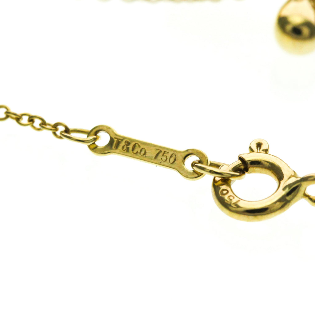 Tiffany Cross · 18K Yellow Gold
