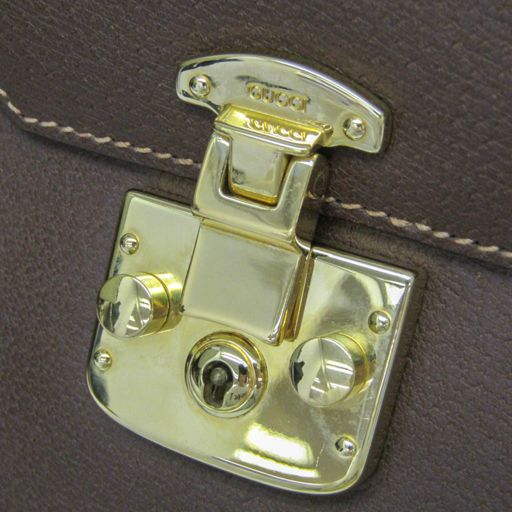 Gucci Lady Rock · Leather