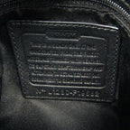Coach Signature · Canvas & Leather