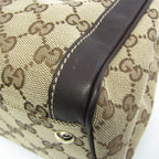 Gucci GG Canvas · Leather Handbag