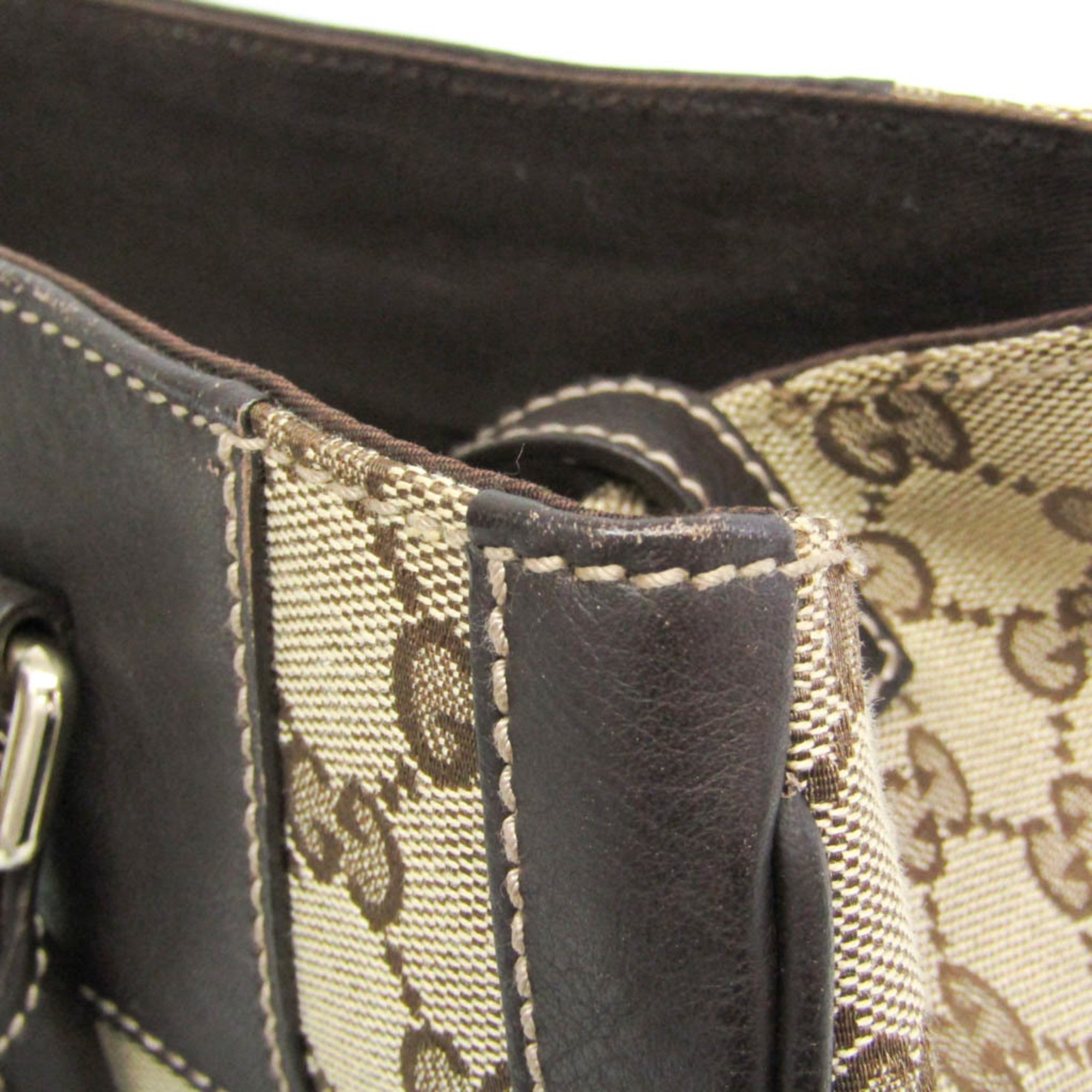 Gucci GG Canvas · Leather Handbag