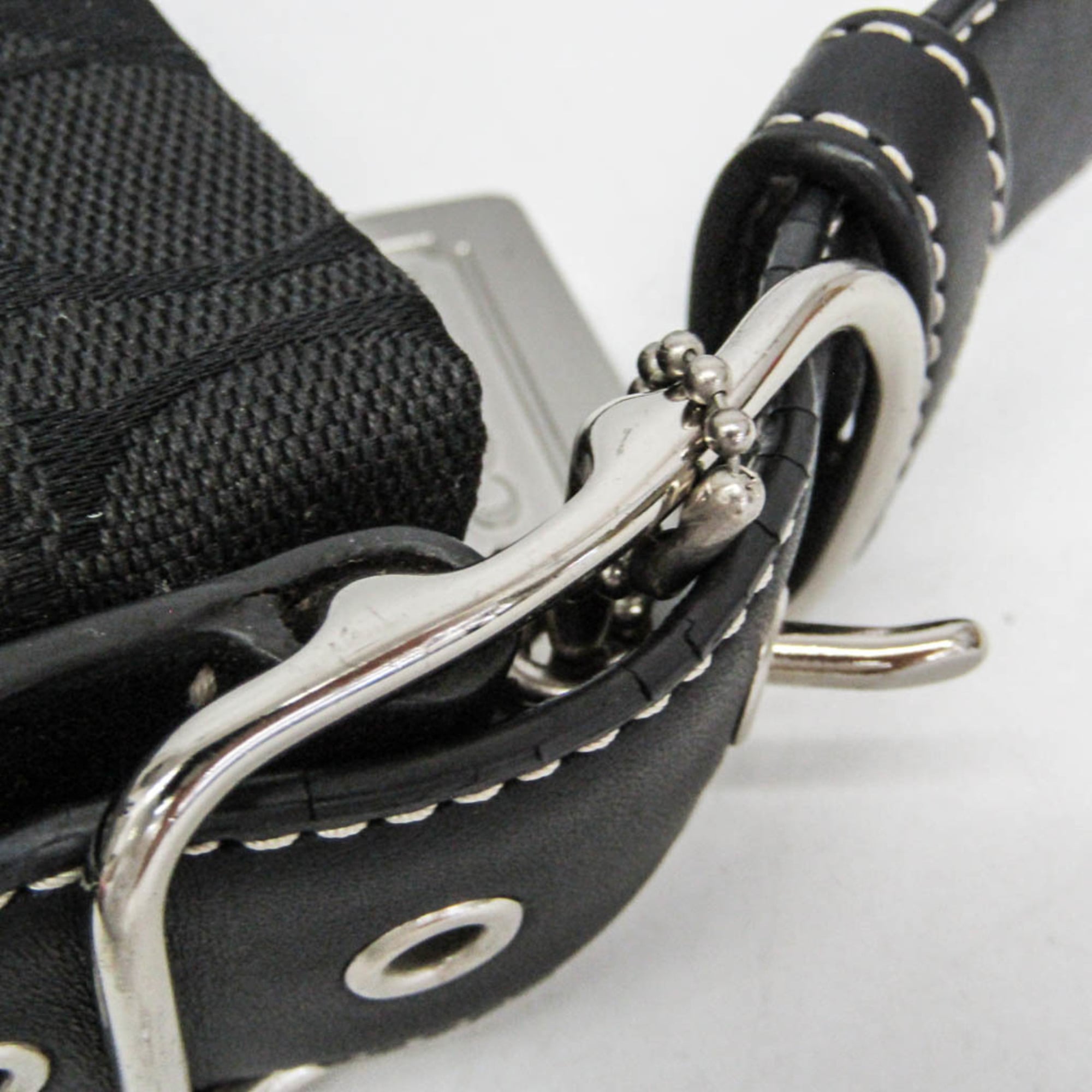 Coach Signature · Canvas & Leather