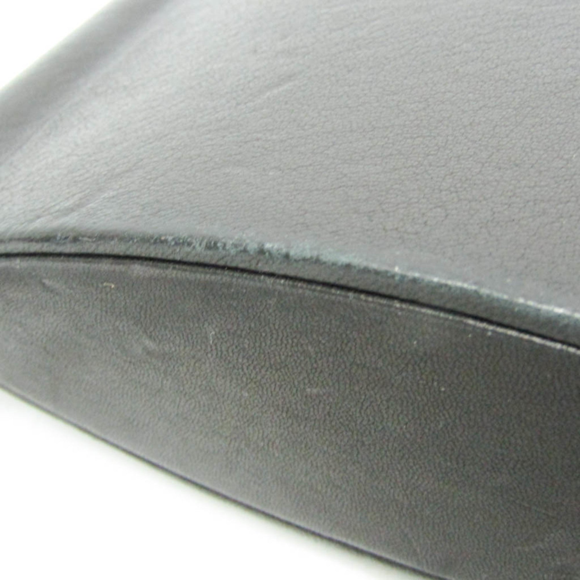 Yves Saint Laurent Opium · Leather