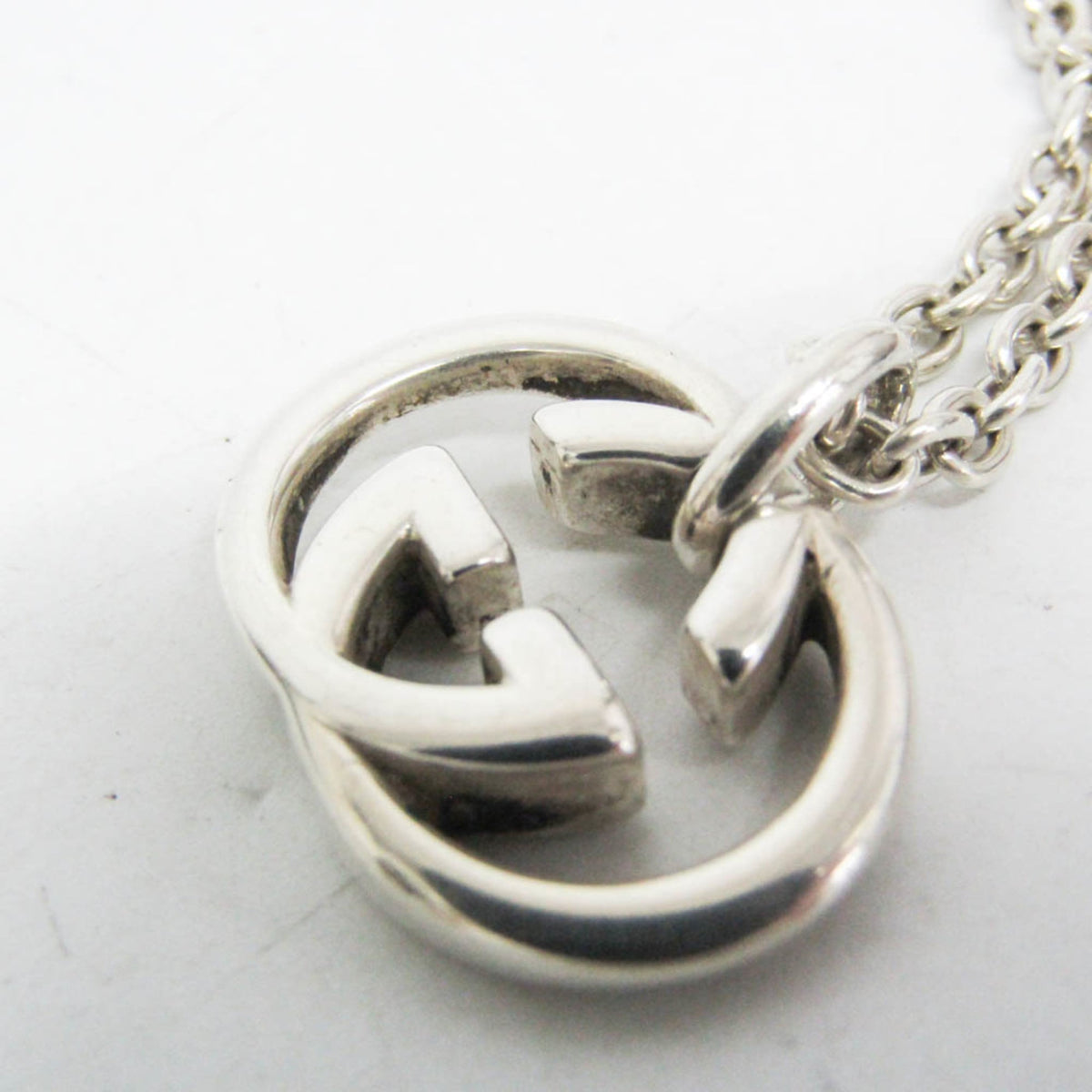 Gucci Interlocking G · Sterling Silver