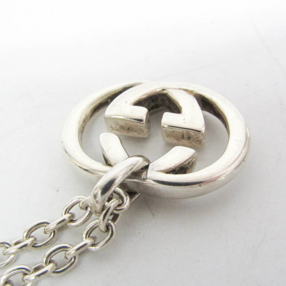 Gucci Interlocking G · Sterling Silver