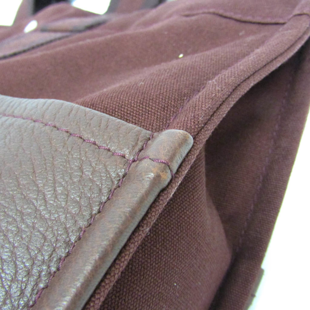 Hermès Fourre Tout MM · Canvas & Leather