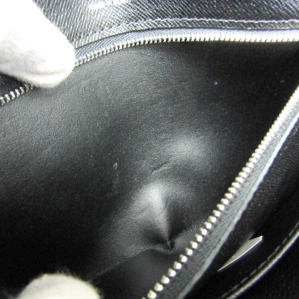 Louis Vuitton Taiga Selenga · Clutch