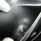 Louis Vuitton Taiga Selenga · Clutch