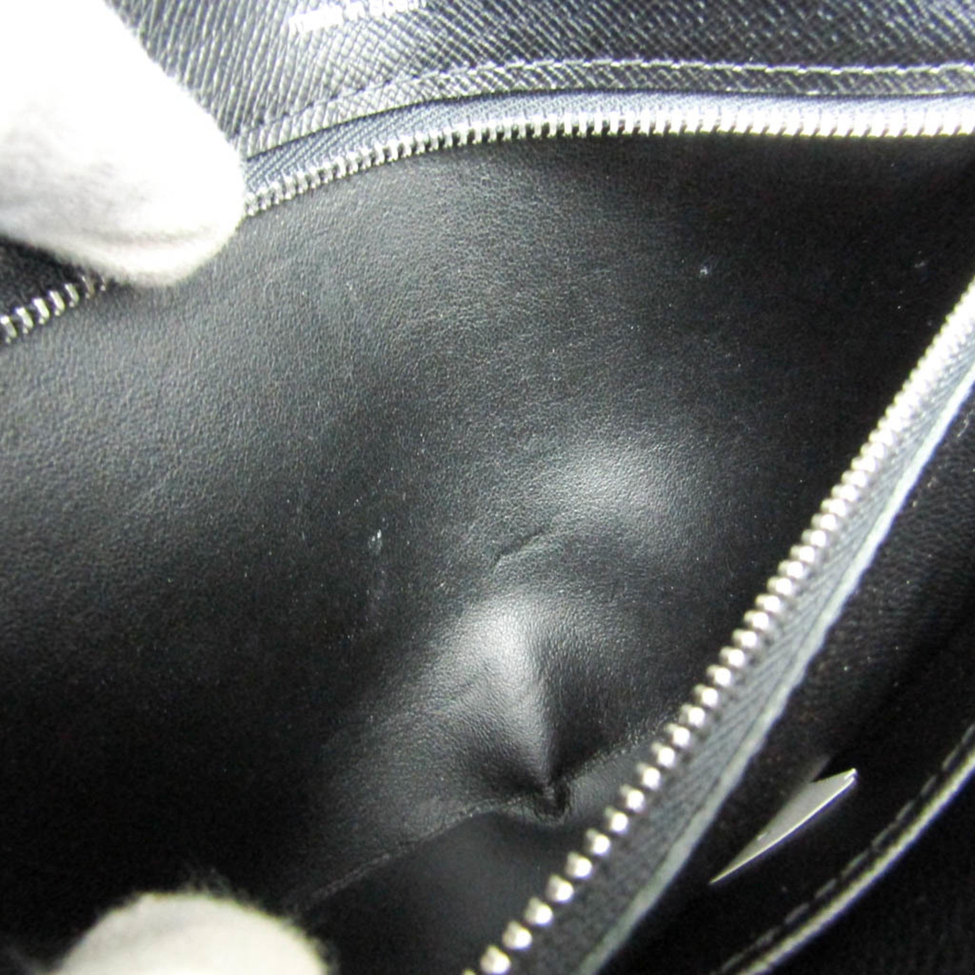 Louis Vuitton Taiga Selenga · Clutch