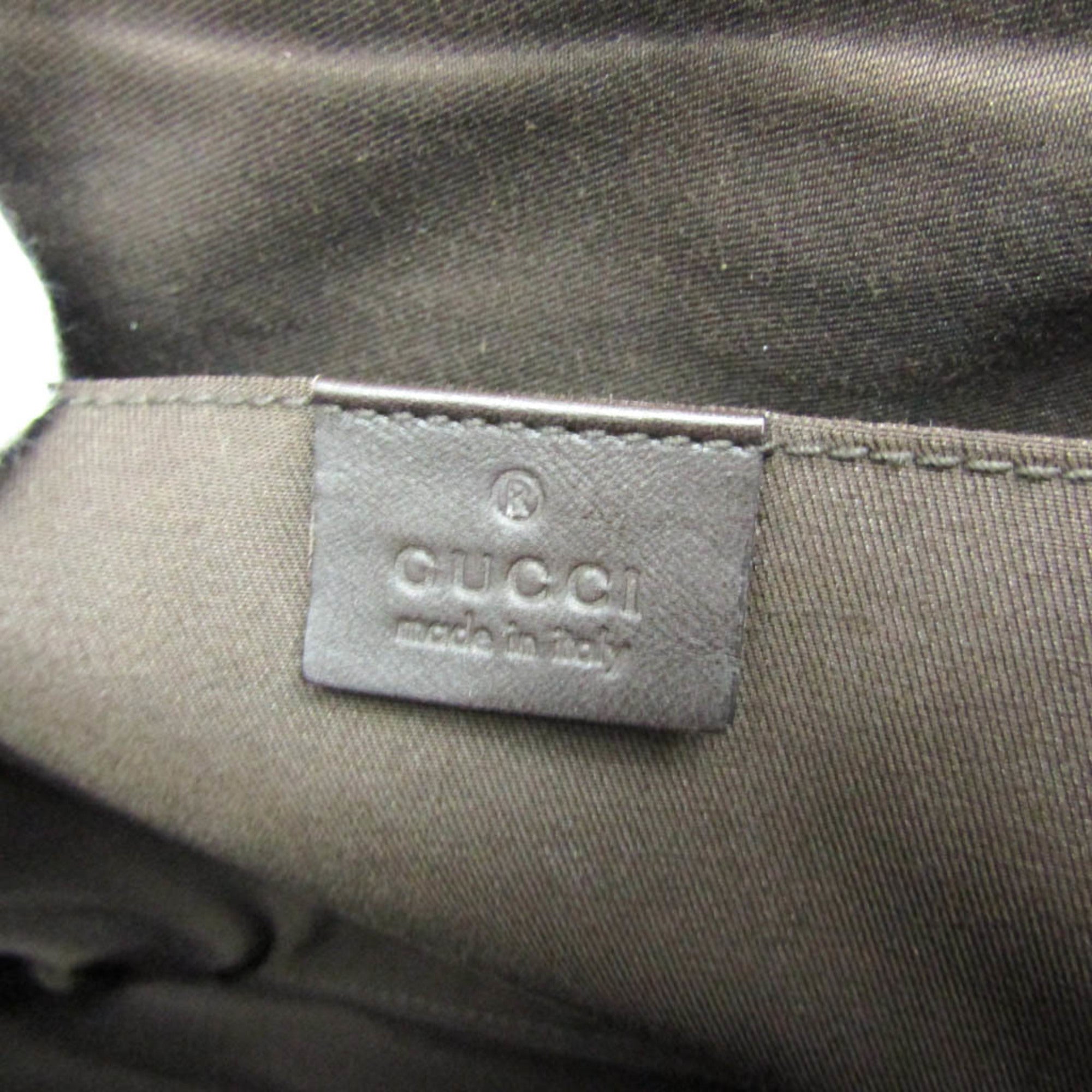Gucci GG Canvas · Leather Handbag