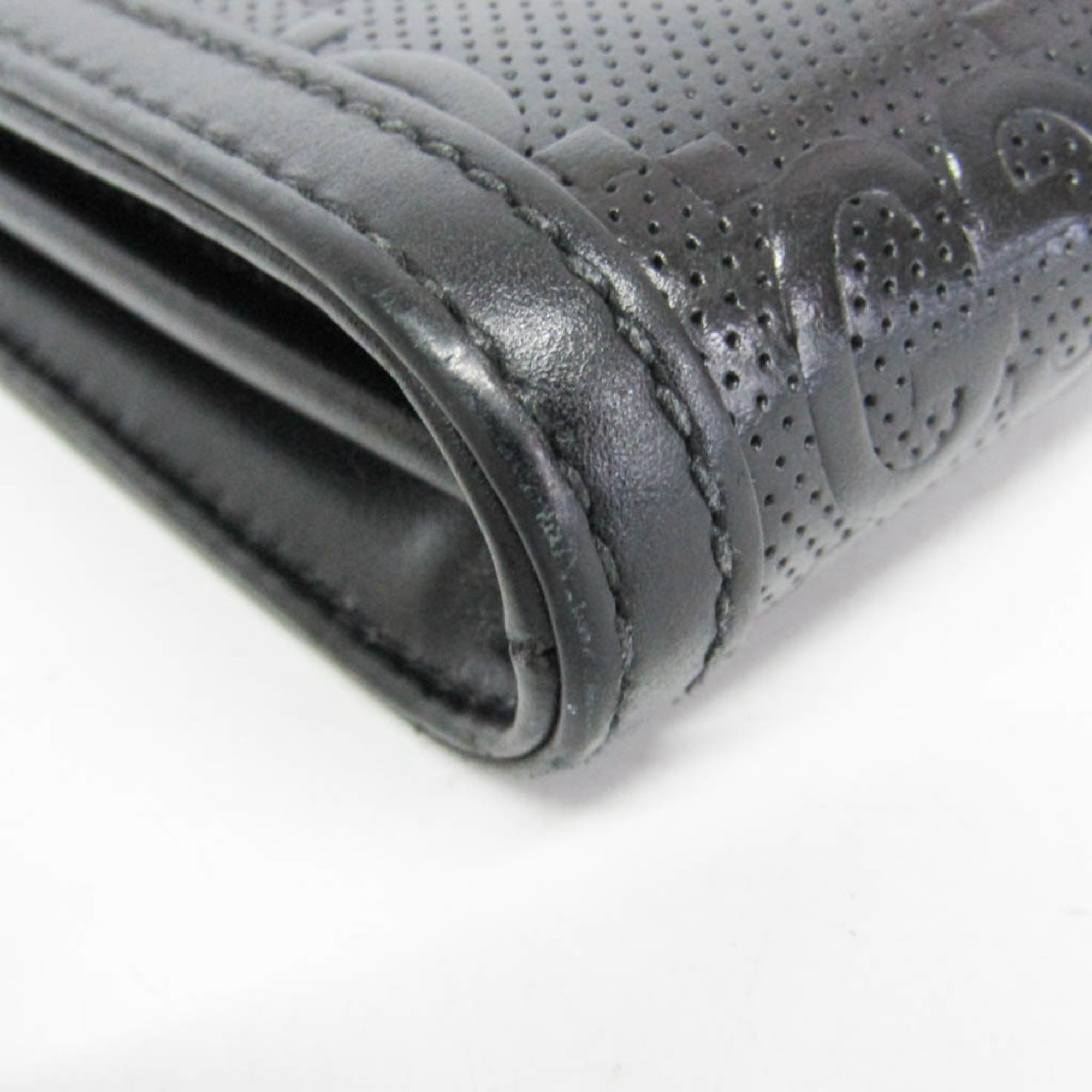 Gucci GG Embossed Crossbody · Leather