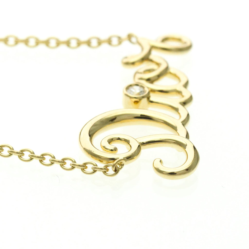 Christian Dior Dioramour · 18K Yellow Gold