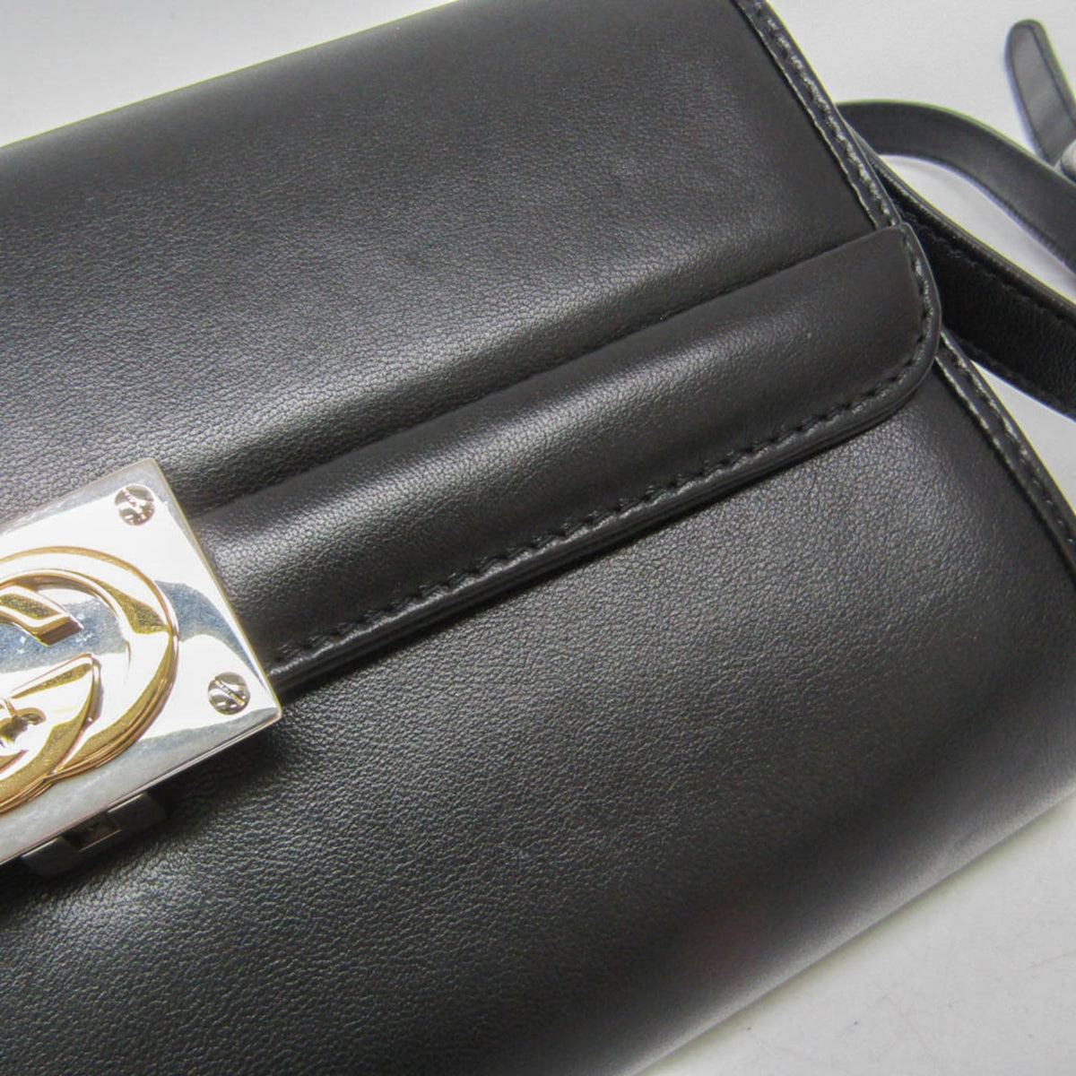 Gucci Interlocking · Leather Clutch