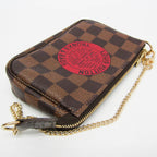 Louis Vuitton Damier Ebene · Mini Pochette