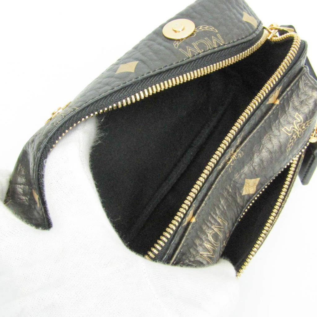 MCM Visetos Triple Body · Coated Canvas