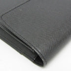Louis Vuitton Taiga Selenga · Clutch