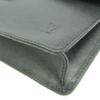 Louis Vuitton Taiga Selenga · Clutch