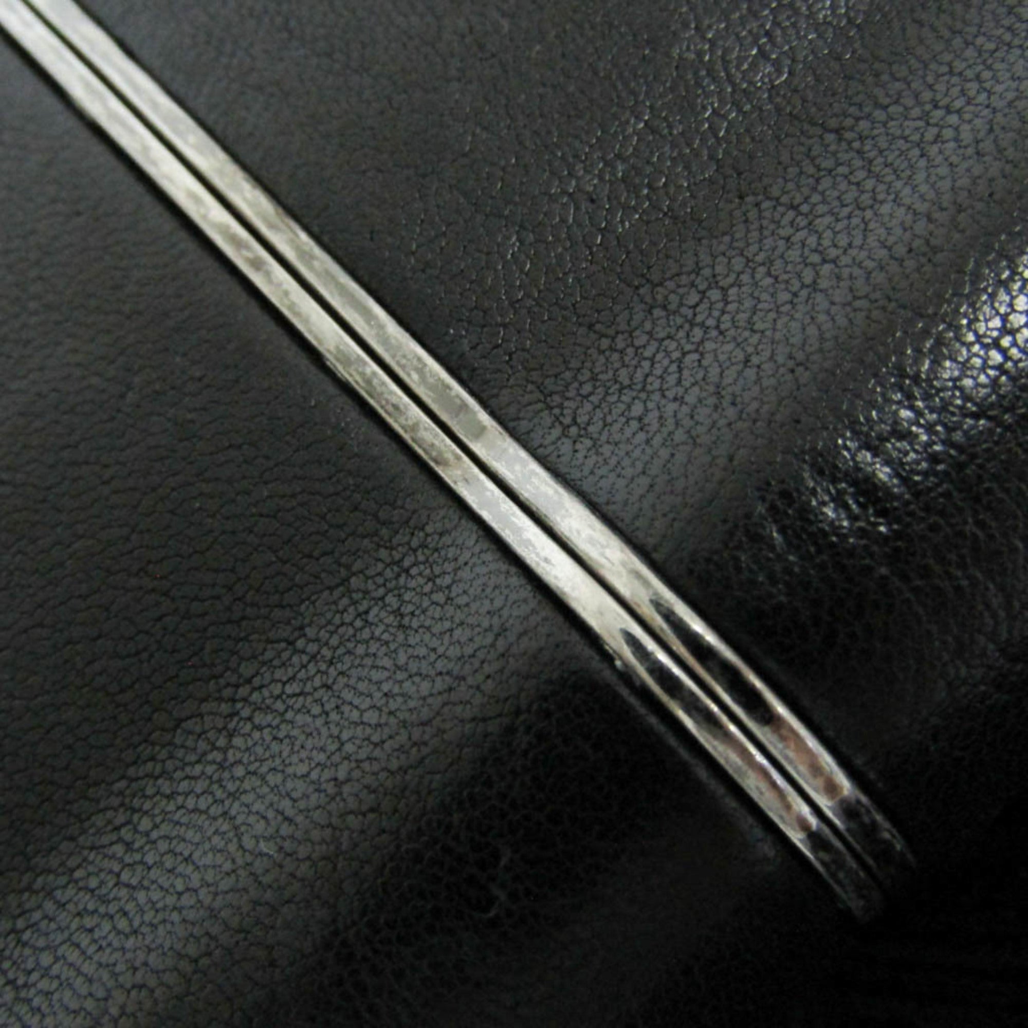 Yves Saint Laurent Opium · Leather
