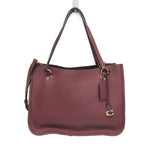 Coach Tyler Carryall · Leather