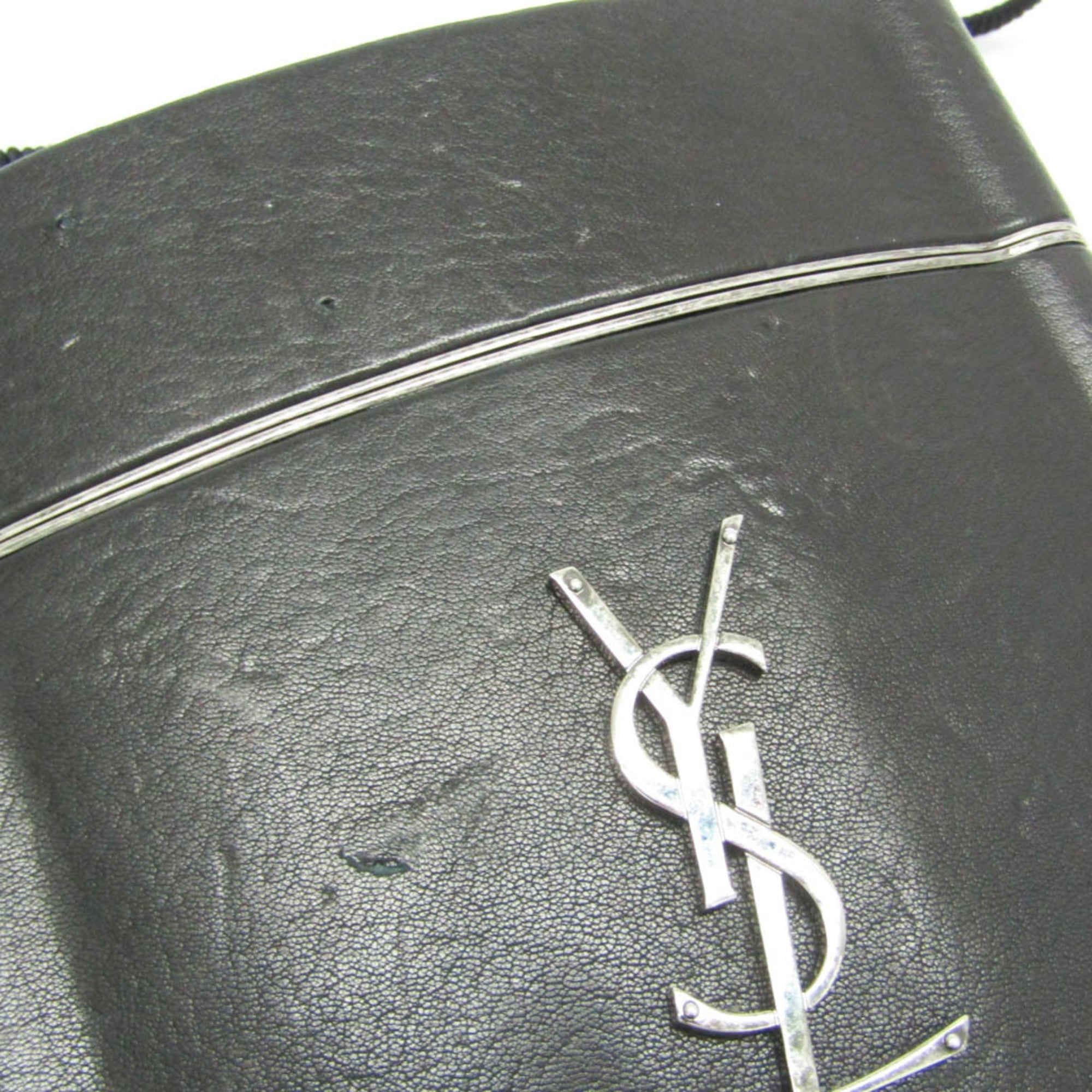 Yves Saint Laurent Opium · Leather