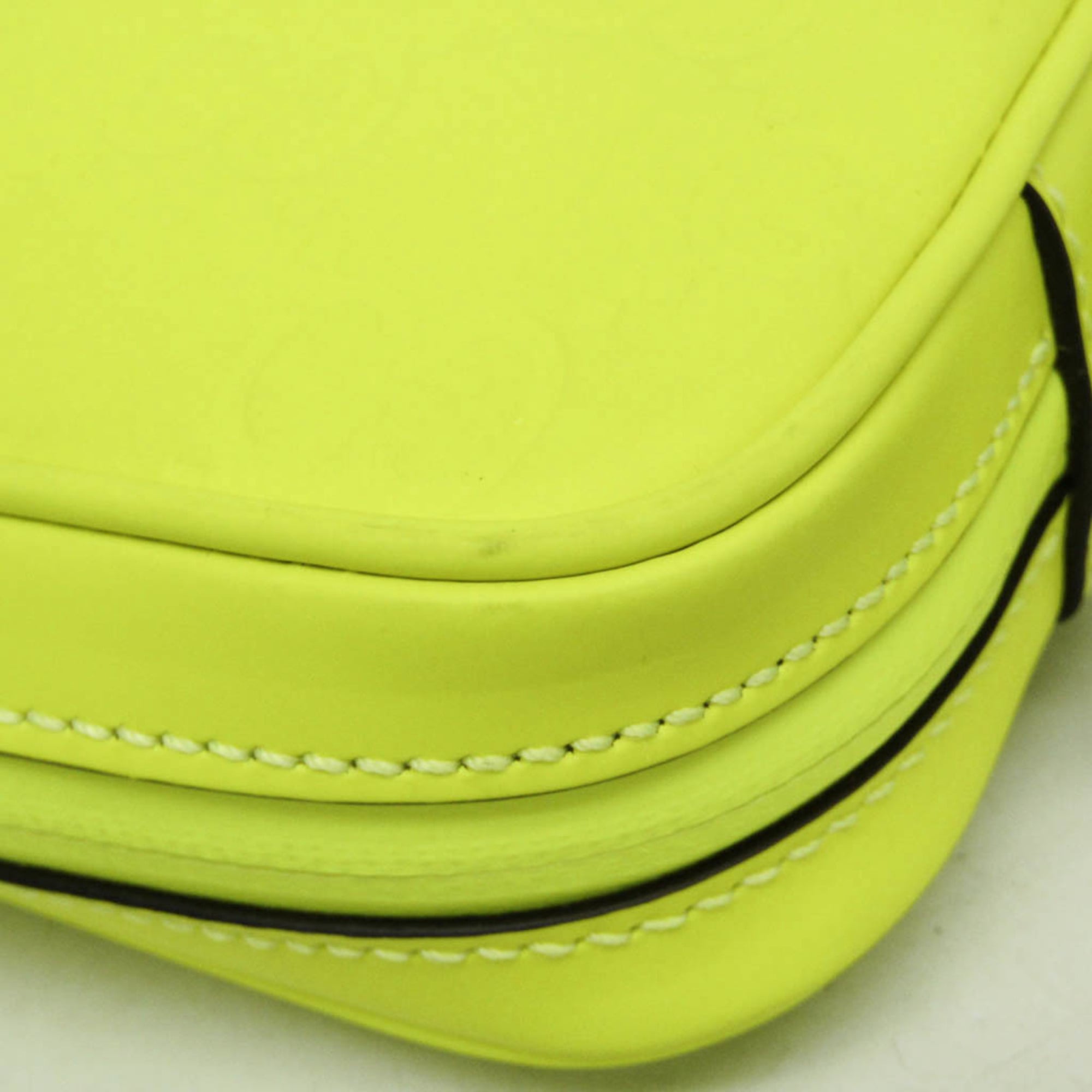 Gucci GG Rubber Effect · Neon Clutch