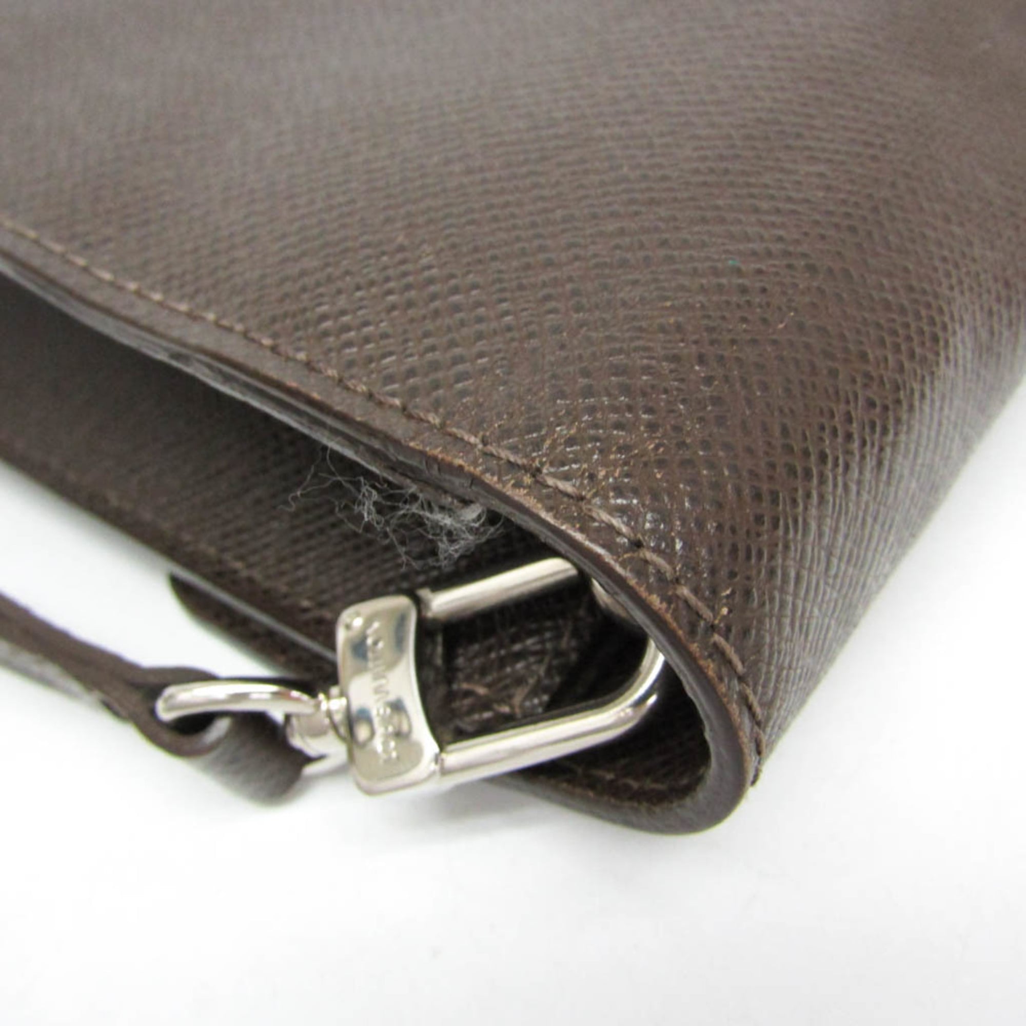 Louis Vuitton Veraia · Taiga Leather