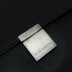 Louis Vuitton Taiga Selenga · Clutch