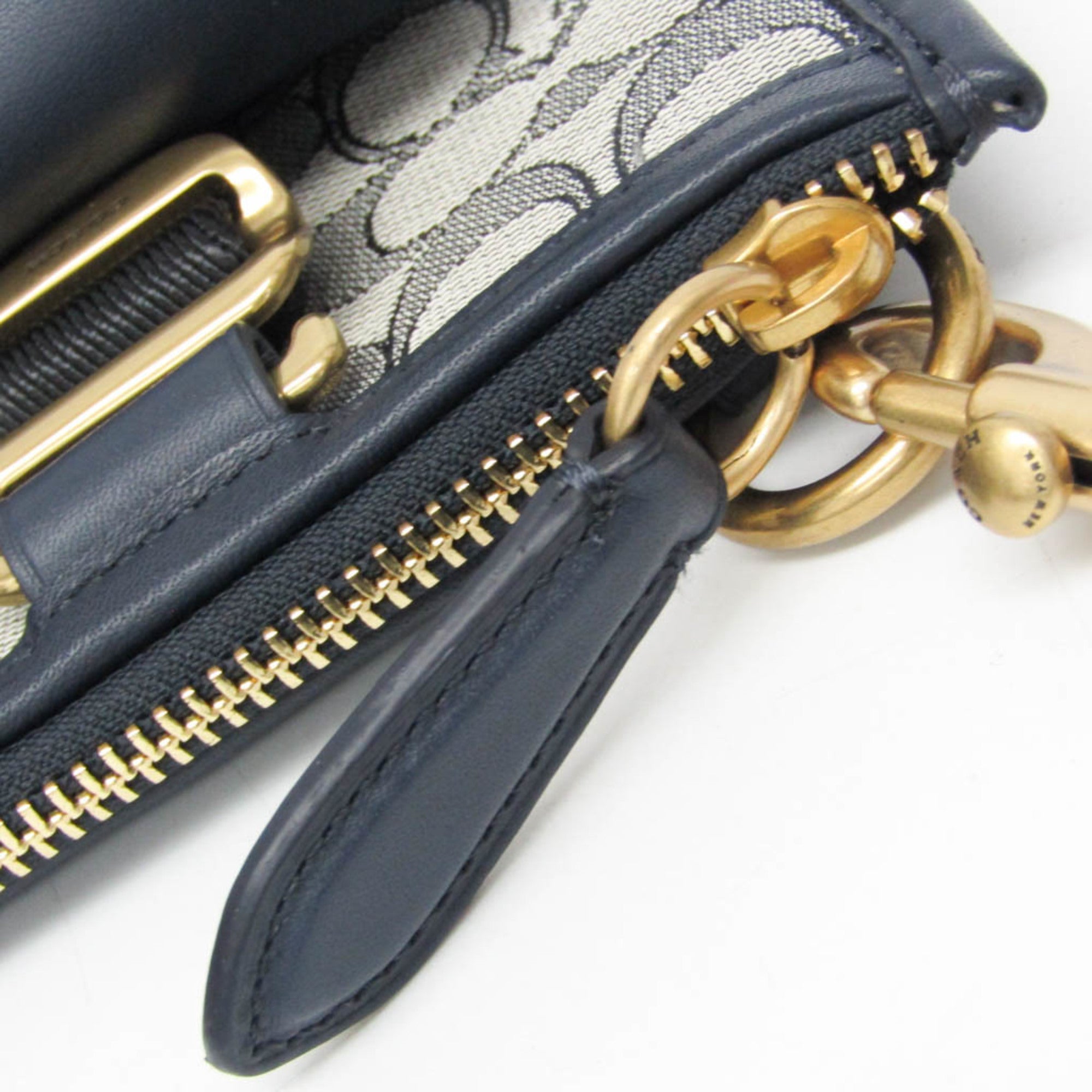 Coach Signature · Canvas Shoulder Bag