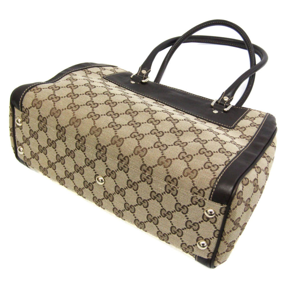 Gucci GG Canvas · Leather Handbag