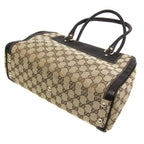 Gucci GG Canvas · Leather Handbag