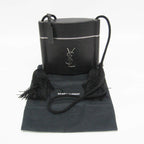 Yves Saint Laurent Opium · Leather