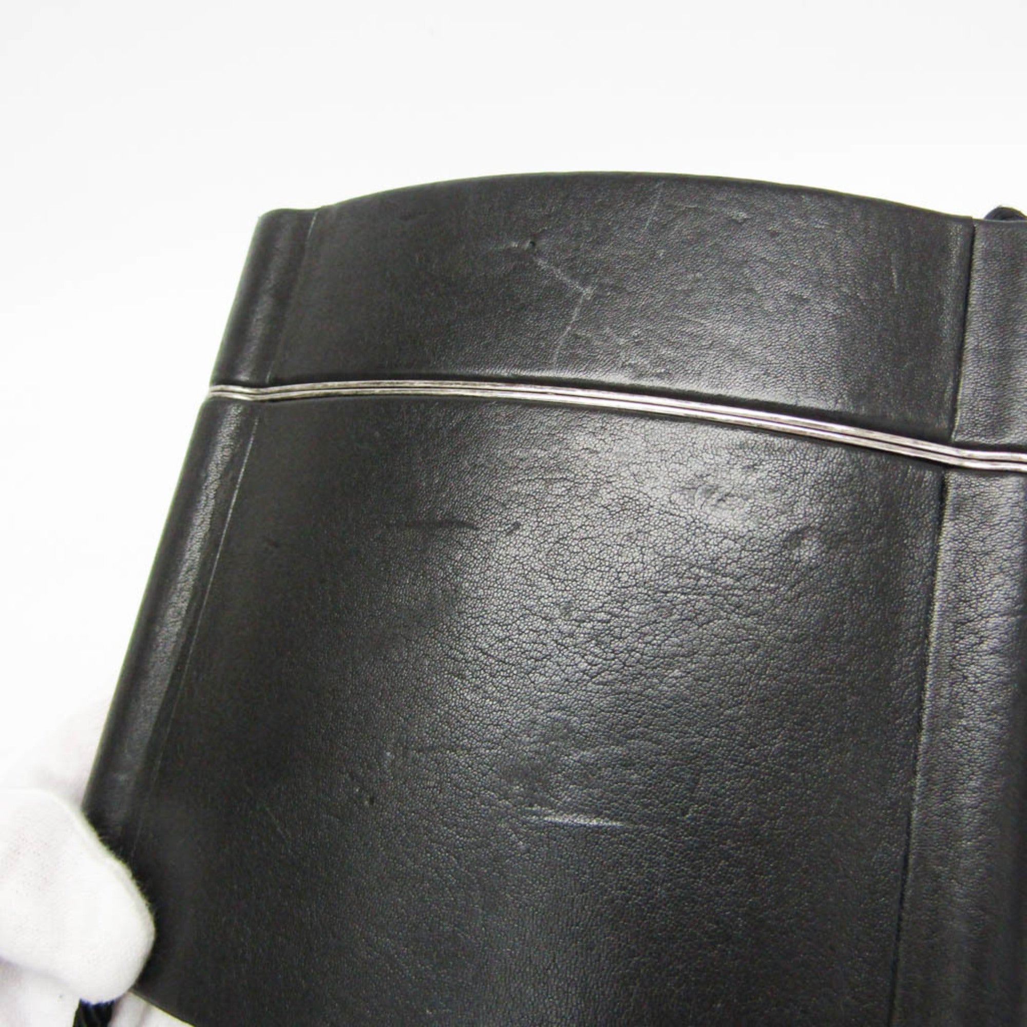 Yves Saint Laurent Opium · Leather