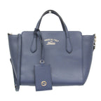 Gucci Swing · Leather