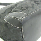 Coach Signature · Canvas & Leather