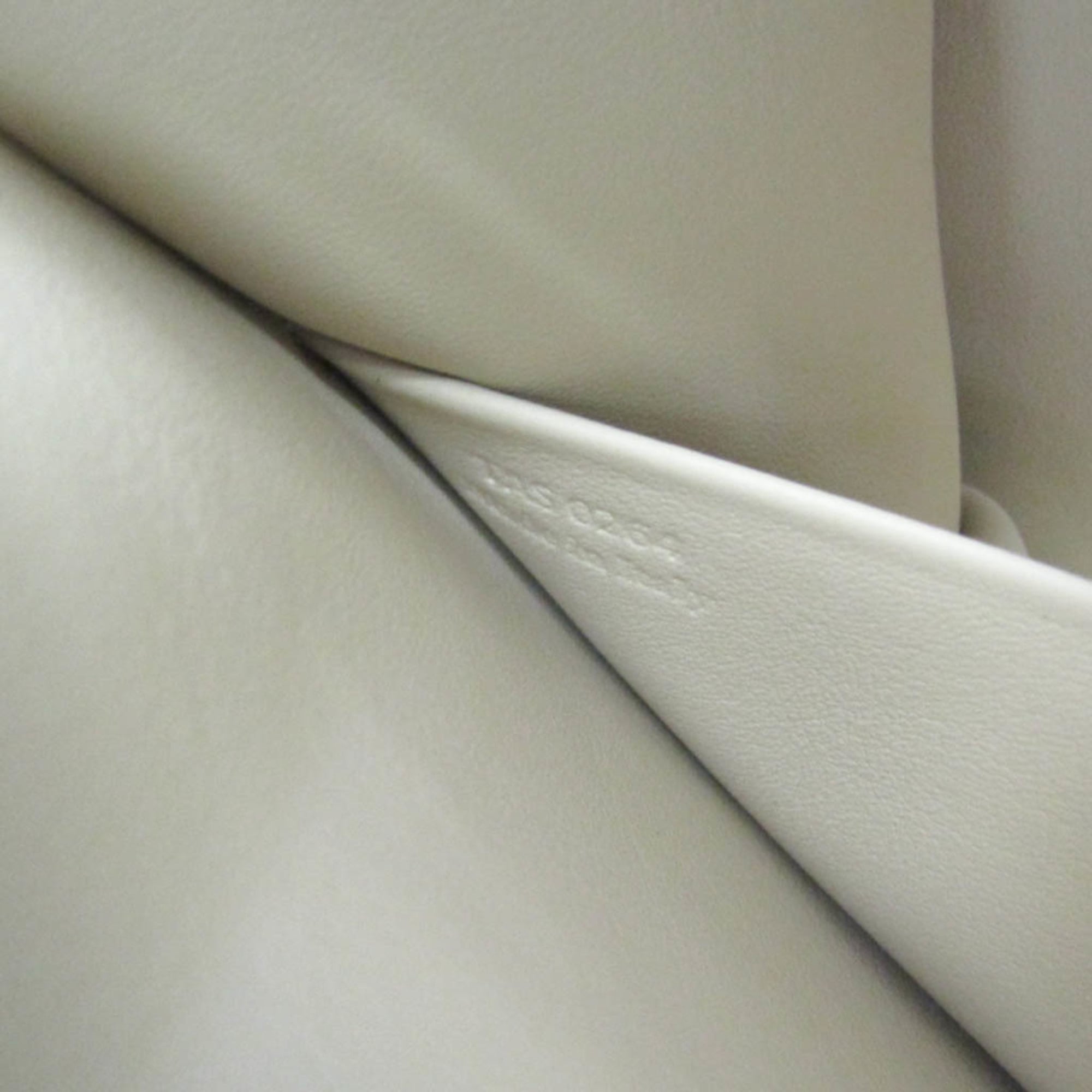Moreau · Coated Canvas & Leather
