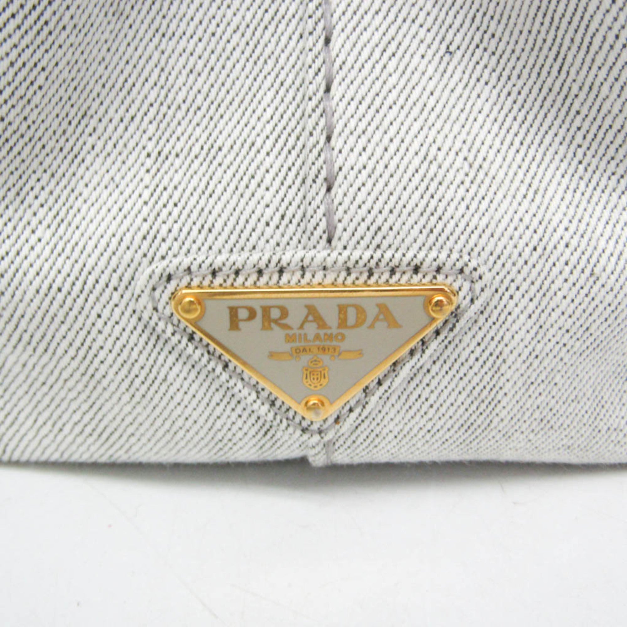 Prada Canapa · Denim · Flower Corsage