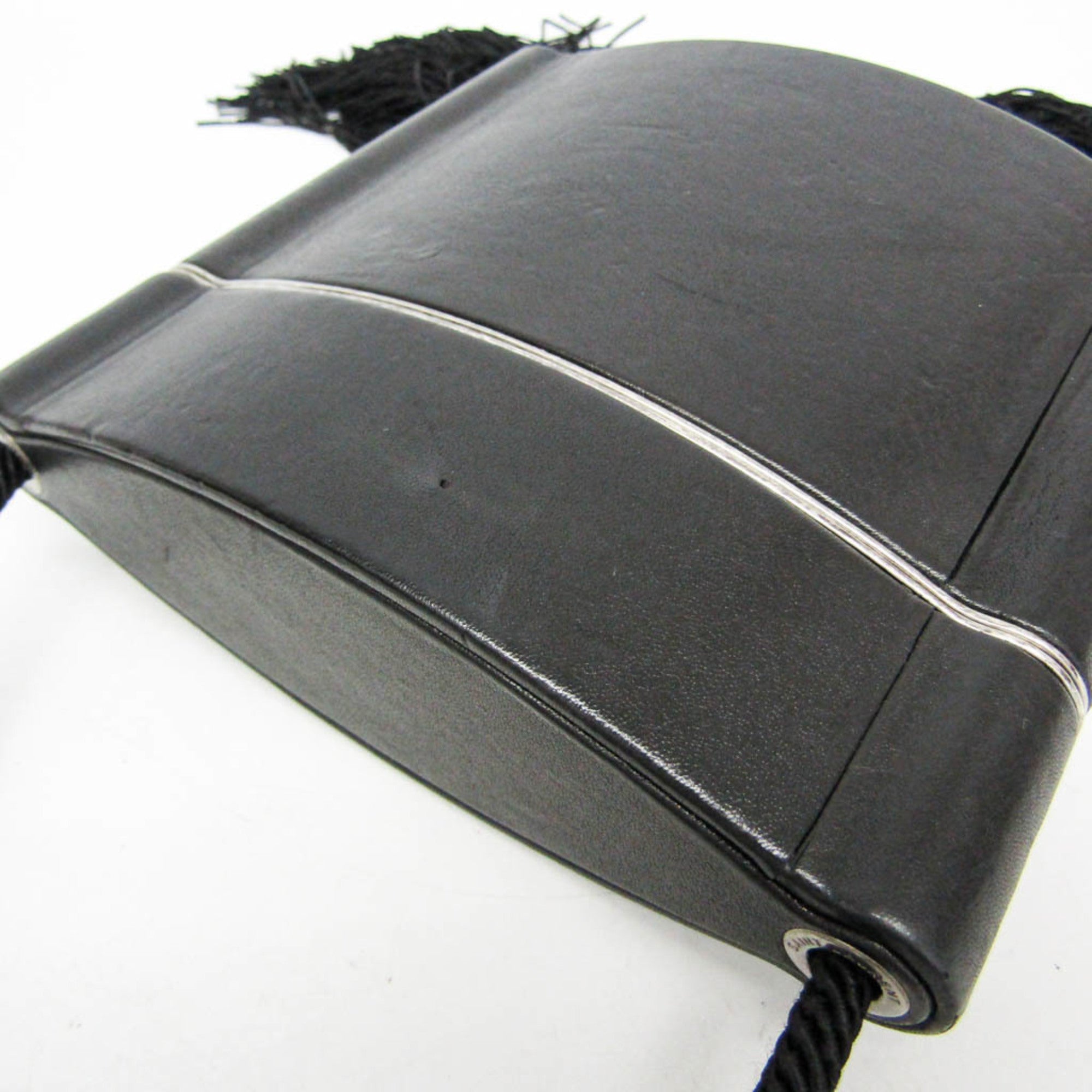 Yves Saint Laurent Opium · Leather