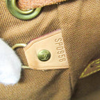 Louis Vuitton Montsouris MM · Monogram