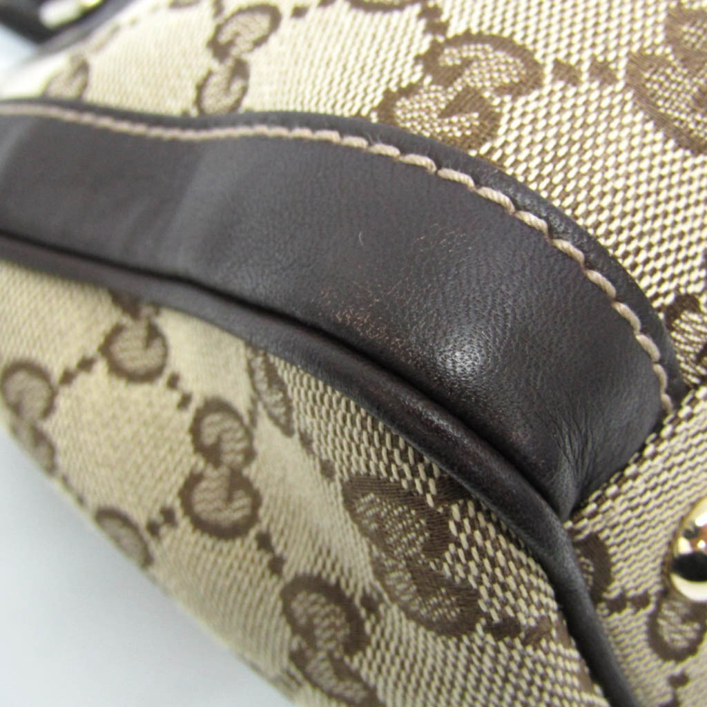 Gucci GG Canvas · Leather Handbag