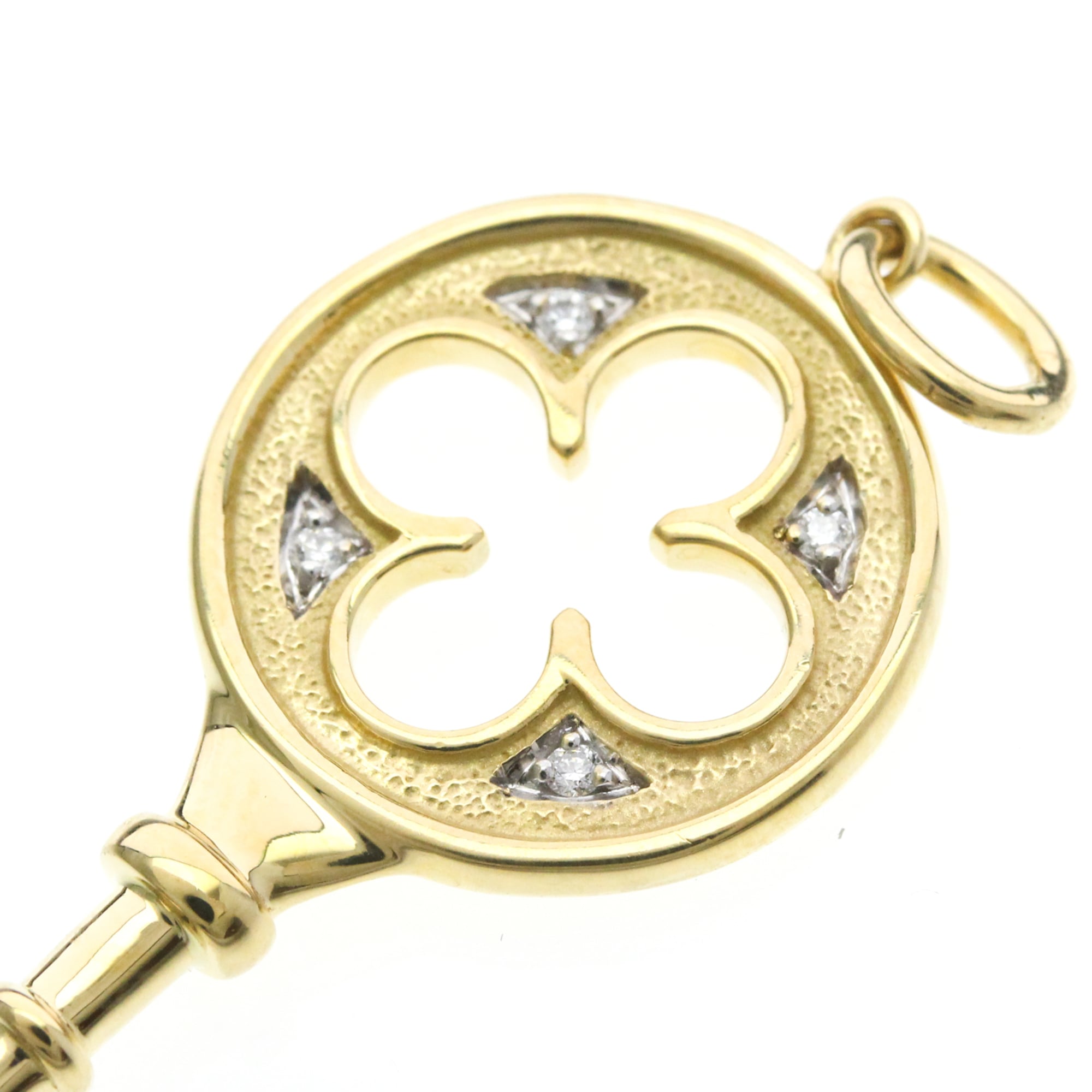 Tiffany Clover Key · 18K Yellow Gold · Diamond