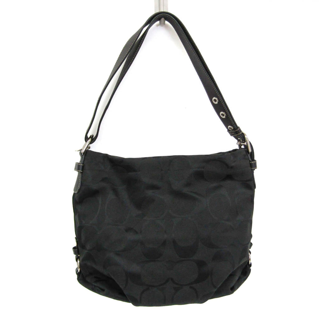 Coach Signature · Canvas & Leather
