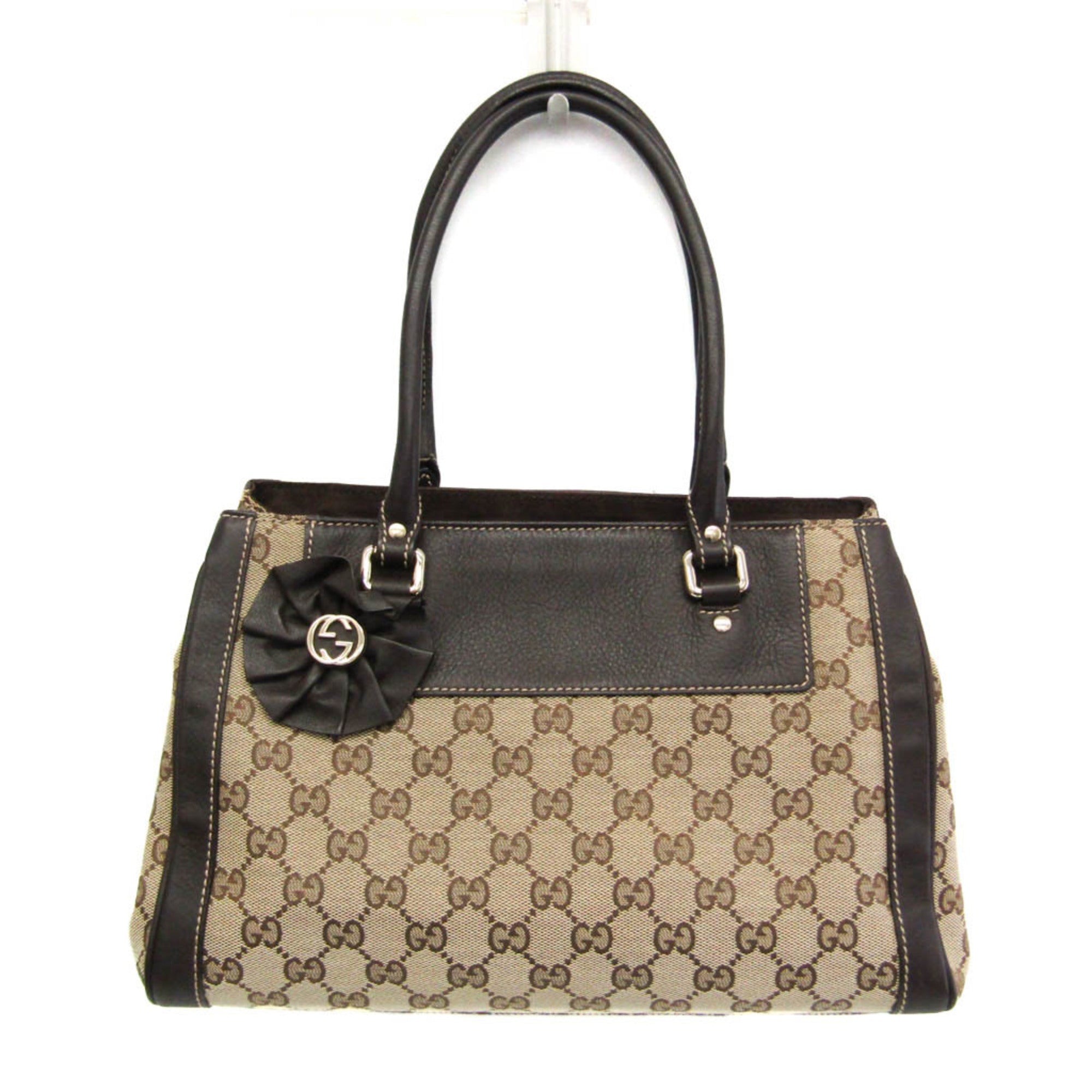 Gucci GG Canvas · Leather Handbag