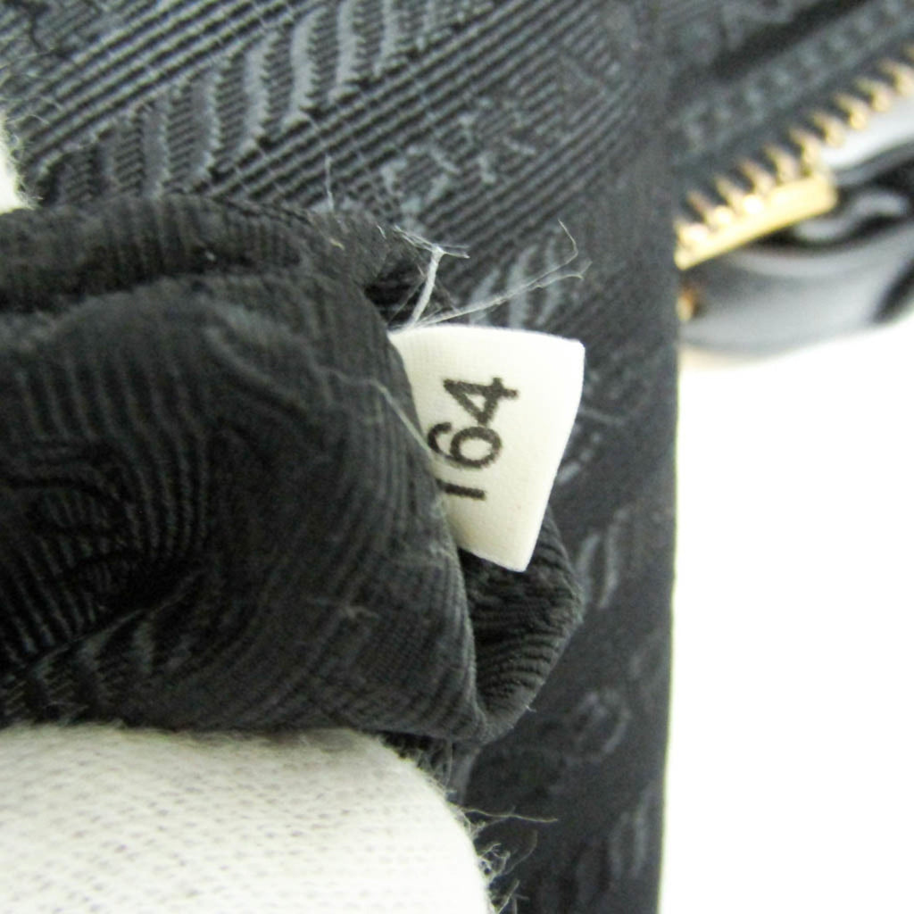 Prada · Nylon & Leather Tote