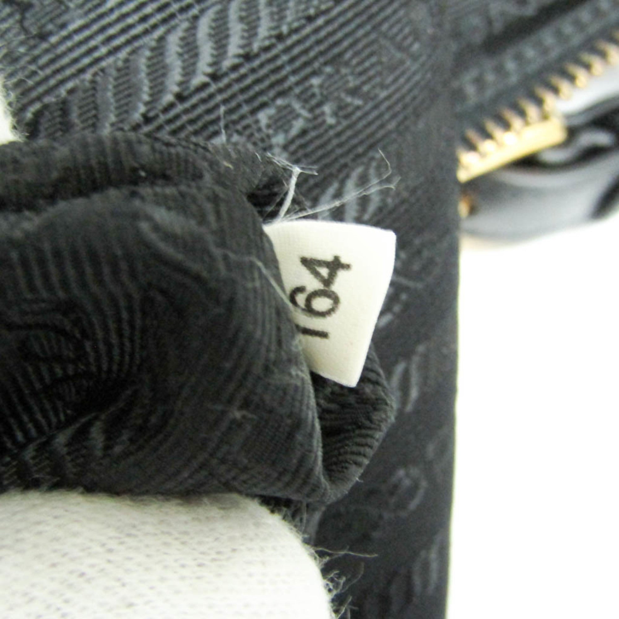 Prada · Nylon & Leather Tote