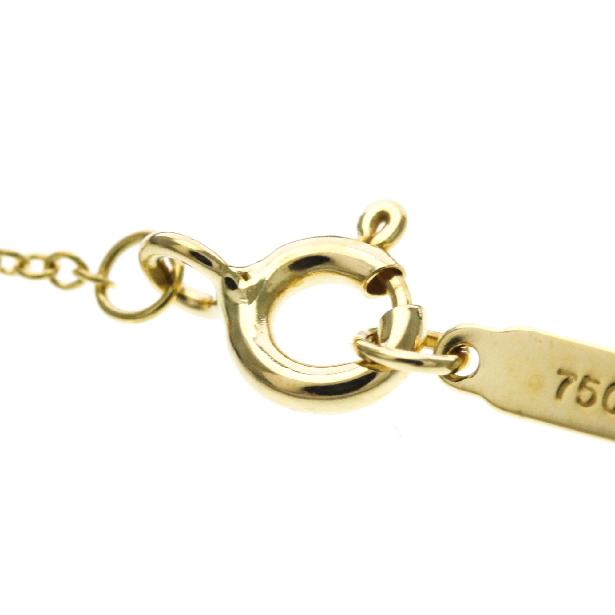 Tiffany Cross · 18K Yellow Gold · Diamond