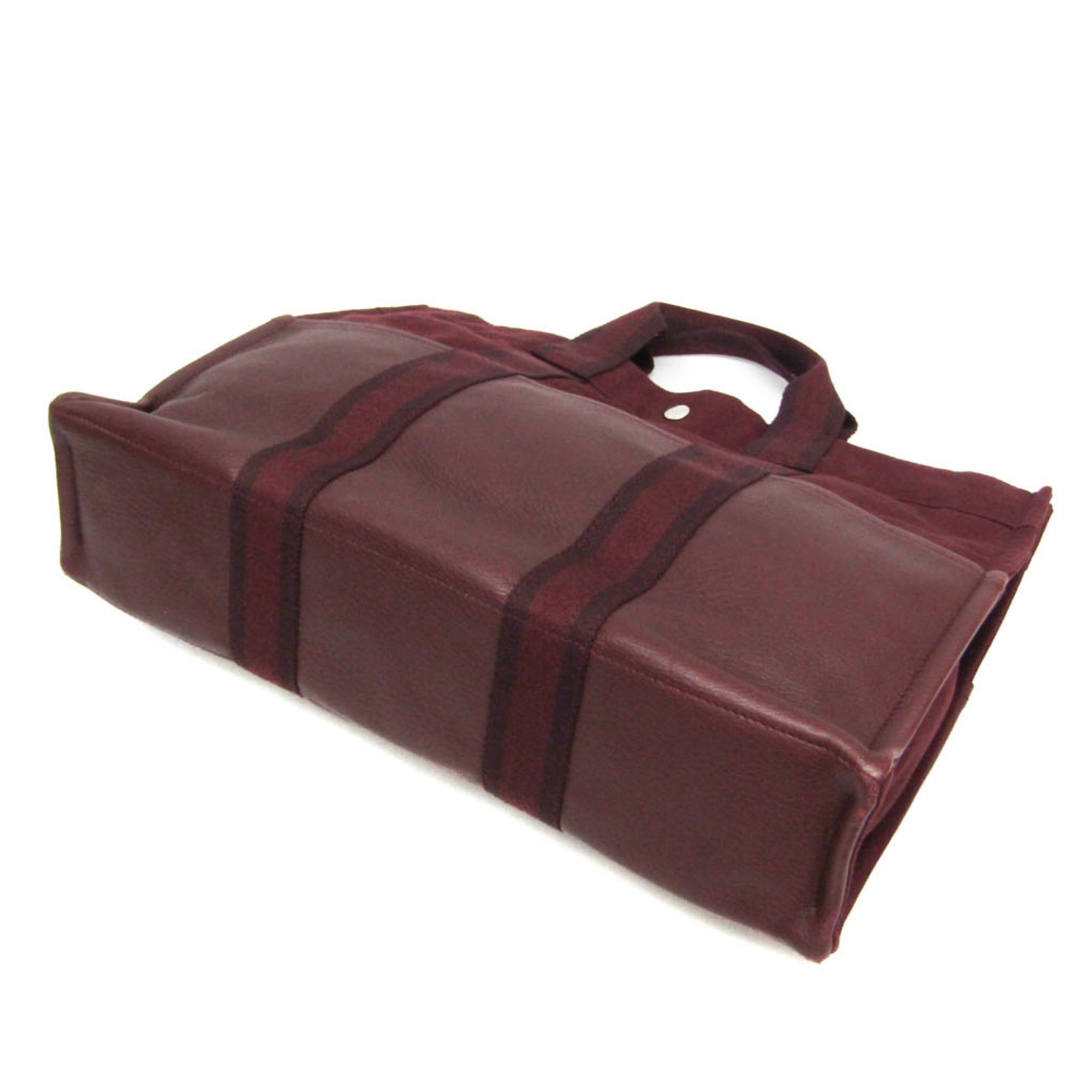 Hermès Fourre Tout MM · Canvas & Leather